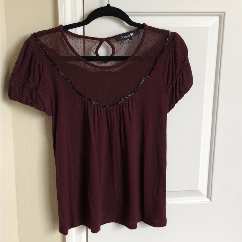 Maroon top with black beading and lace accents